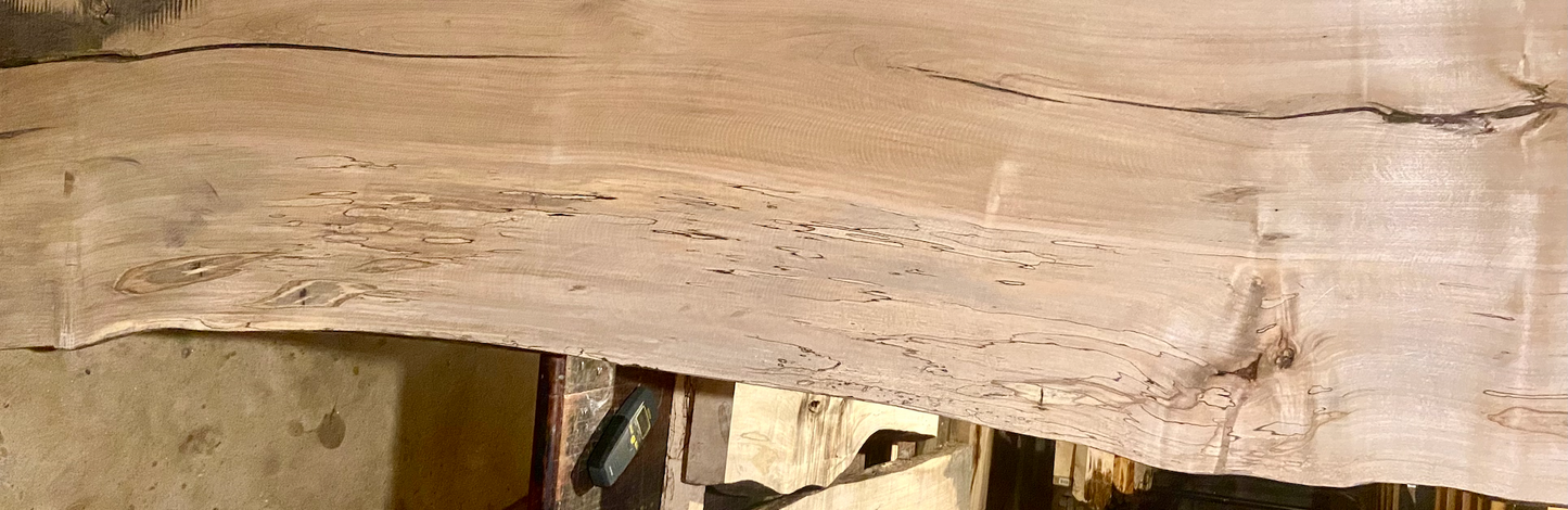 Handmade spalted hardwood vanity top with smooth finish and organic live edge front. Solid wood bathroom vanity top featuring spalted grain, knot detail, and natural character.