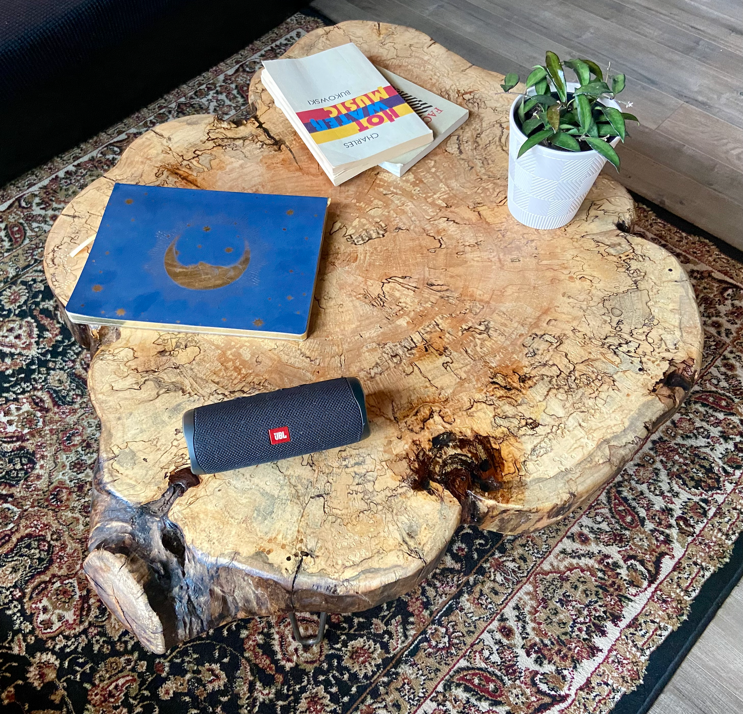 Handmade spalted maple live edge nesting table set with organic shapes and natural wood grain patterns, featuring rustic modern hairpin legs. Handmade spalted maple live edge coffee table set with natural organic shapes, highlighting the rich wood grain and rustic-modern style.