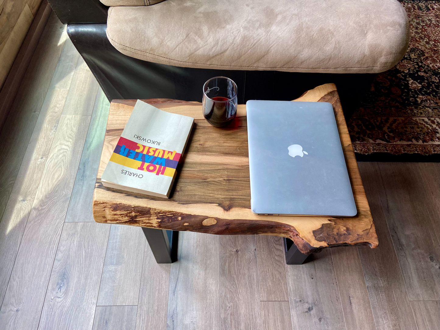 Detailed view of ambrosia maple wood grain, showing natural spalting, color variations, and organic patterns. live edge coffee table made from ambrosia maple, featuring unique grain patterns and a smooth, polished surface. Rustic and modern design. Handcrafted ambrosia maple coffee table styled in a modern living room with a cozy, rustic aesthetic. Top-down view of ambrosia maple coffee table, highlighting natural wood grain, warm tones, and live edge details.