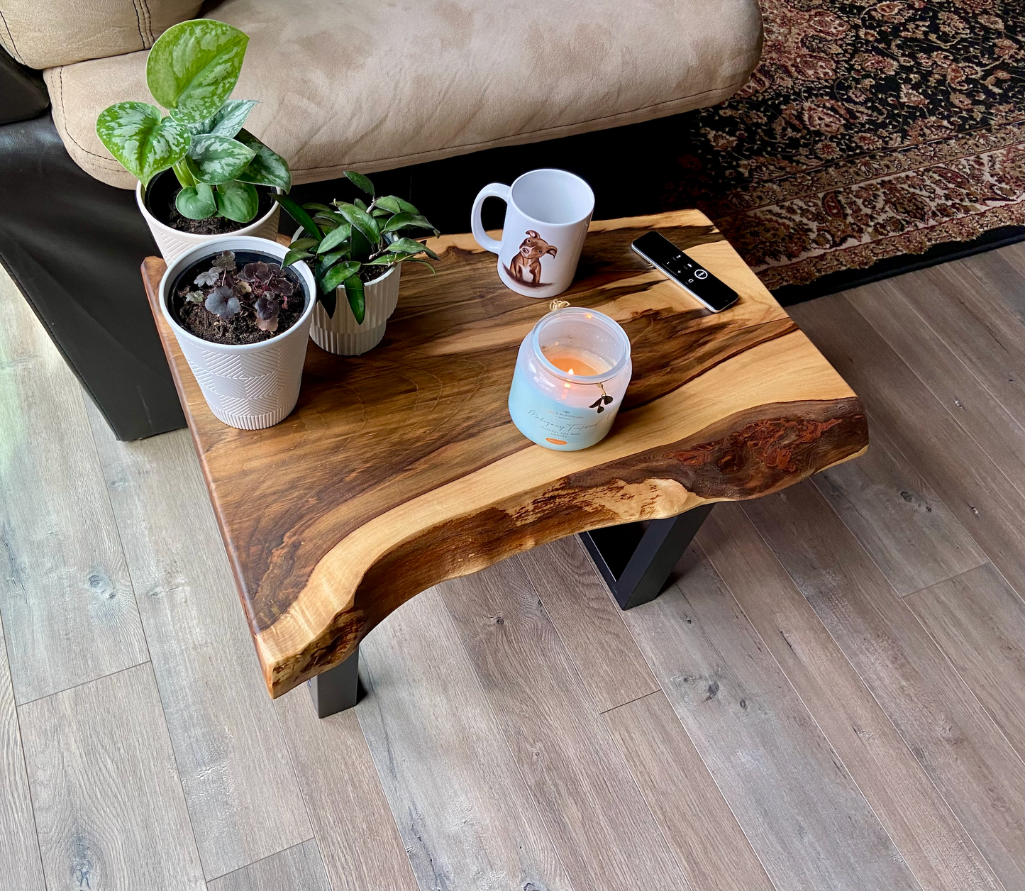 Detailed view of ambrosia maple wood grain, showing natural spalting, color variations, and organic patterns. live edge coffee table made from ambrosia maple, featuring unique grain patterns and a smooth, polished surface. Rustic and modern design. Handcrafted ambrosia maple coffee table styled in a modern living room with a cozy, rustic aesthetic. Top-down view of ambrosia maple coffee table, highlighting natural wood grain, warm tones, and live edge details.