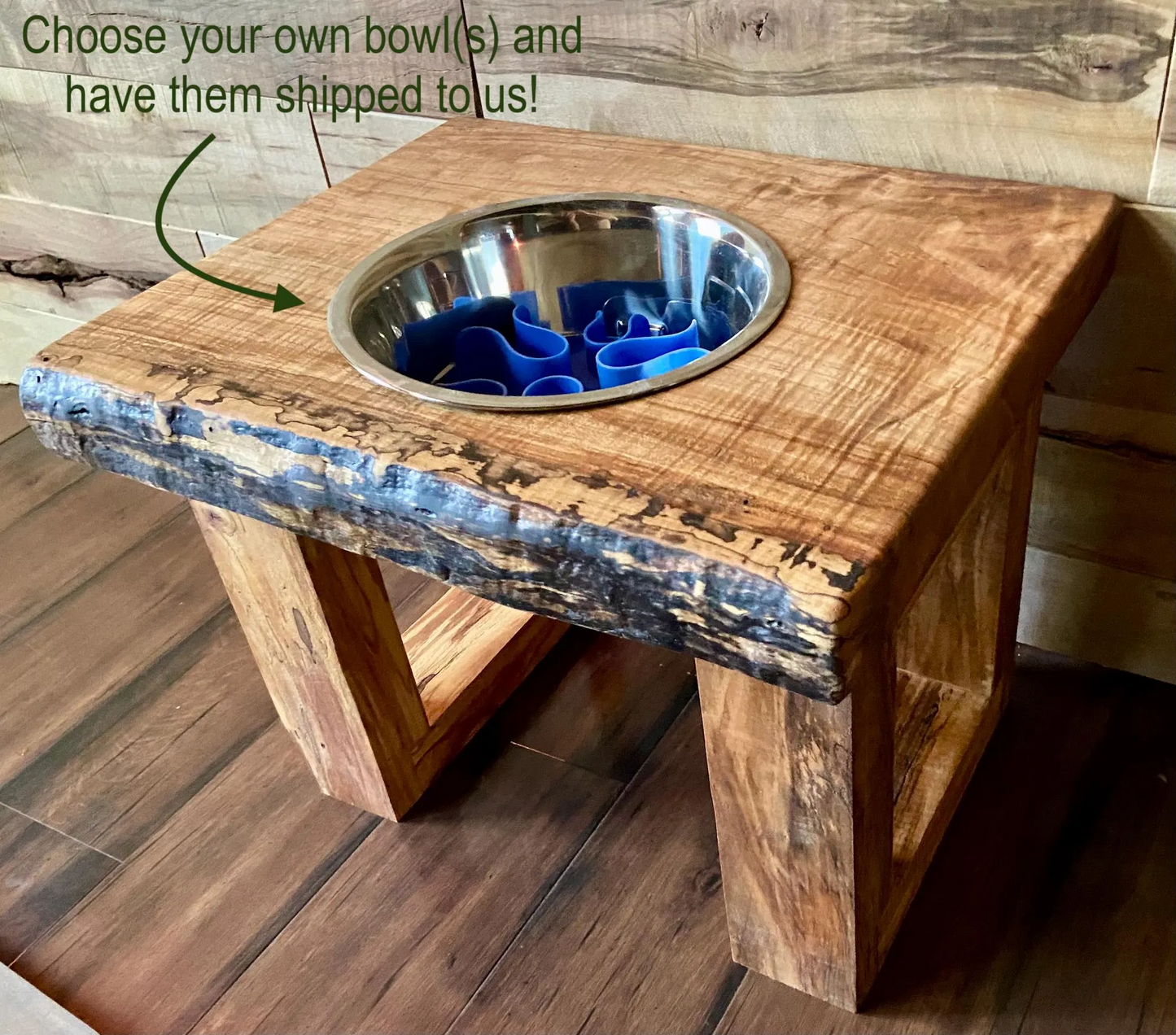 Live edge raised pet stand crafted from spalted maple or black walnut, featuring two stainless steel bowls for food and water. Elevated pet feeder, showcasing the natural wood grain and sturdy construction. Top-down view highlighting the placement of the one stainless steel bowls within the live edge wooden stand. Detailed close-up of the spalted maple’s unique wood grain patterns on the pet stand.