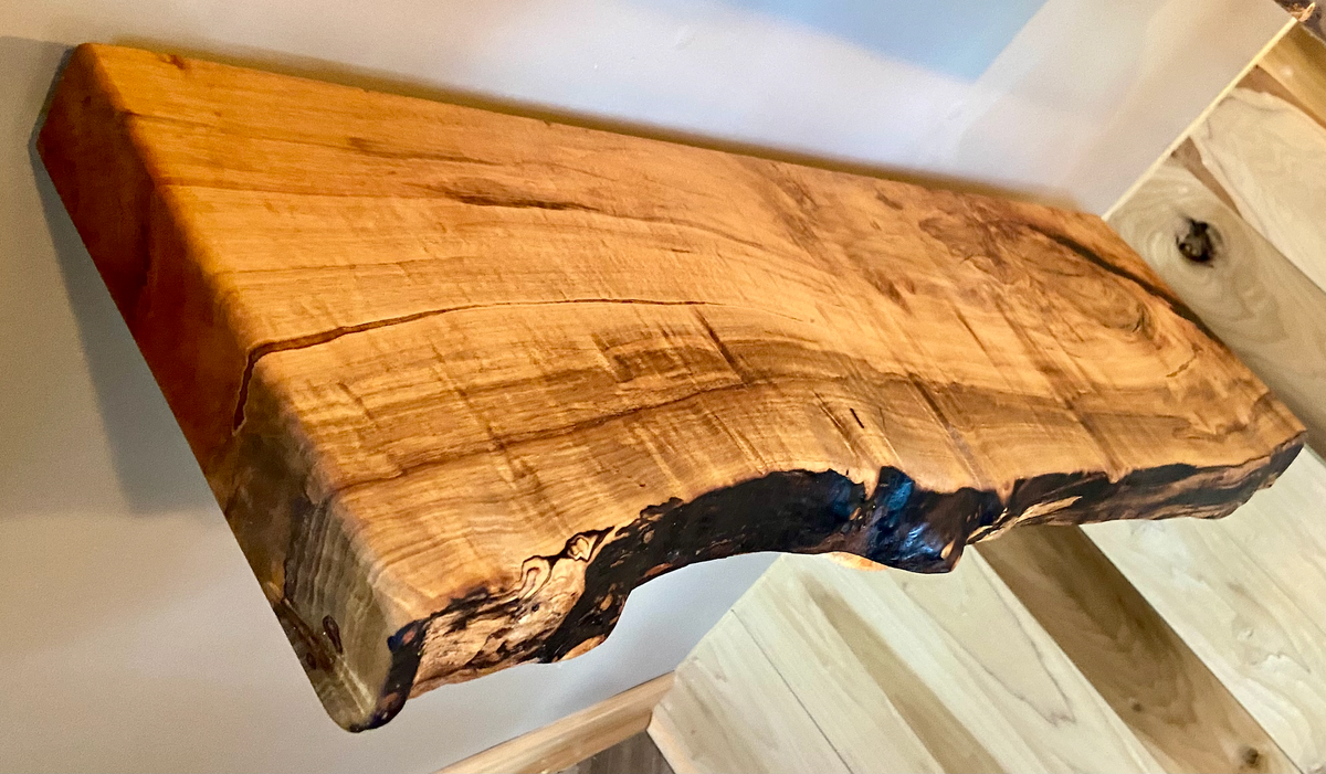 Custom live edge maple shelves with natural wood grain, handcrafted from solid maple. Ideal for rustic, modern, or farmhouse interiors.