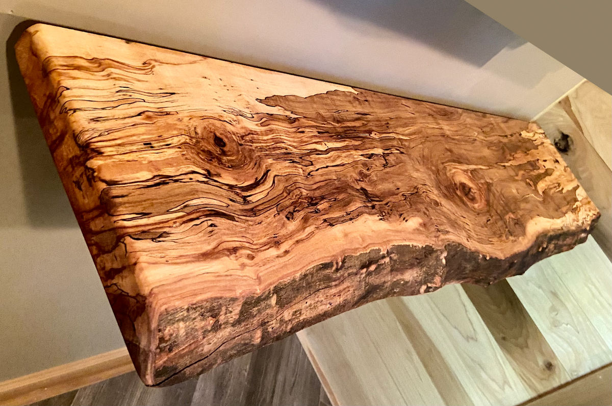 Custom live edge maple shelves with natural wood grain, handcrafted from solid maple. Ideal for rustic, modern, or farmhouse interiors.
