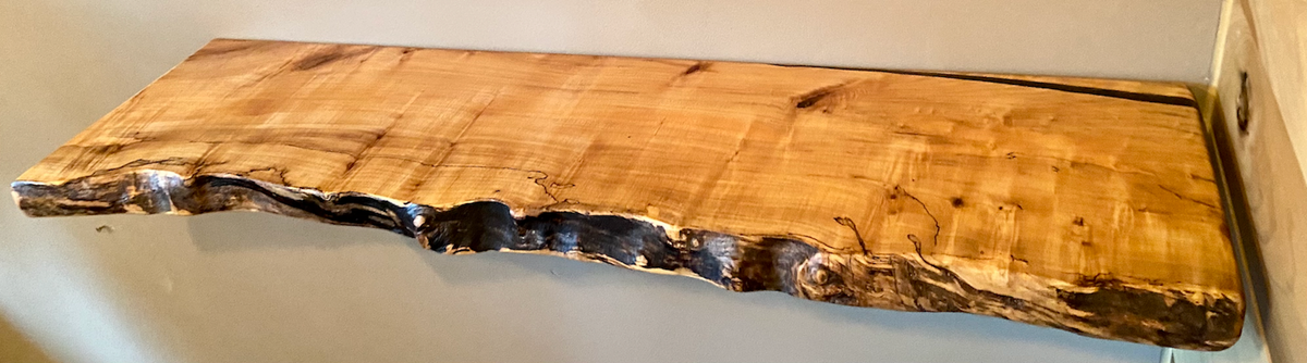 Custom live edge maple shelves with natural wood grain, handcrafted from solid maple. Ideal for rustic, modern, or farmhouse interiors.