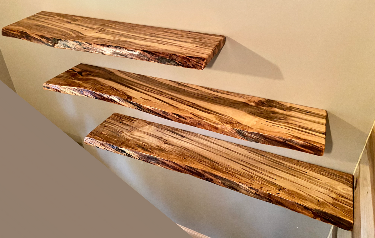 Custom live edge maple shelves with natural wood grain, handcrafted from solid maple. Ideal for rustic, modern, or farmhouse interiors.