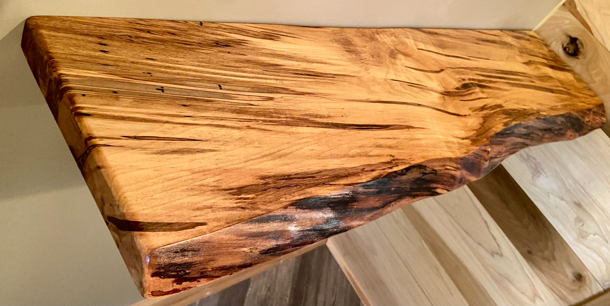 Custom live edge maple shelves with natural wood grain, handcrafted from solid maple. Ideal for rustic, modern, or farmhouse interiors.