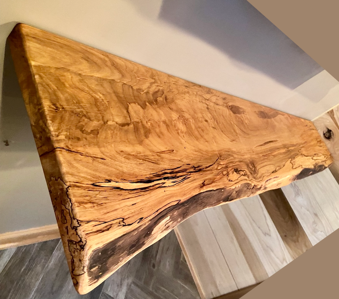 Custom live edge maple shelves with natural wood grain, handcrafted from solid maple. Ideal for rustic, modern, or farmhouse interiors.