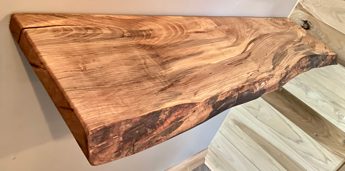 Custom live edge maple shelves with natural wood grain, handcrafted from solid maple. Ideal for rustic, modern, or farmhouse interiors.