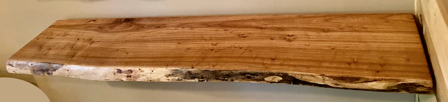 Custom live edge chestnut shelf with natural wood grain, handcrafted from solid maple. Ideal for rustic, modern, or farmhouse interiors.