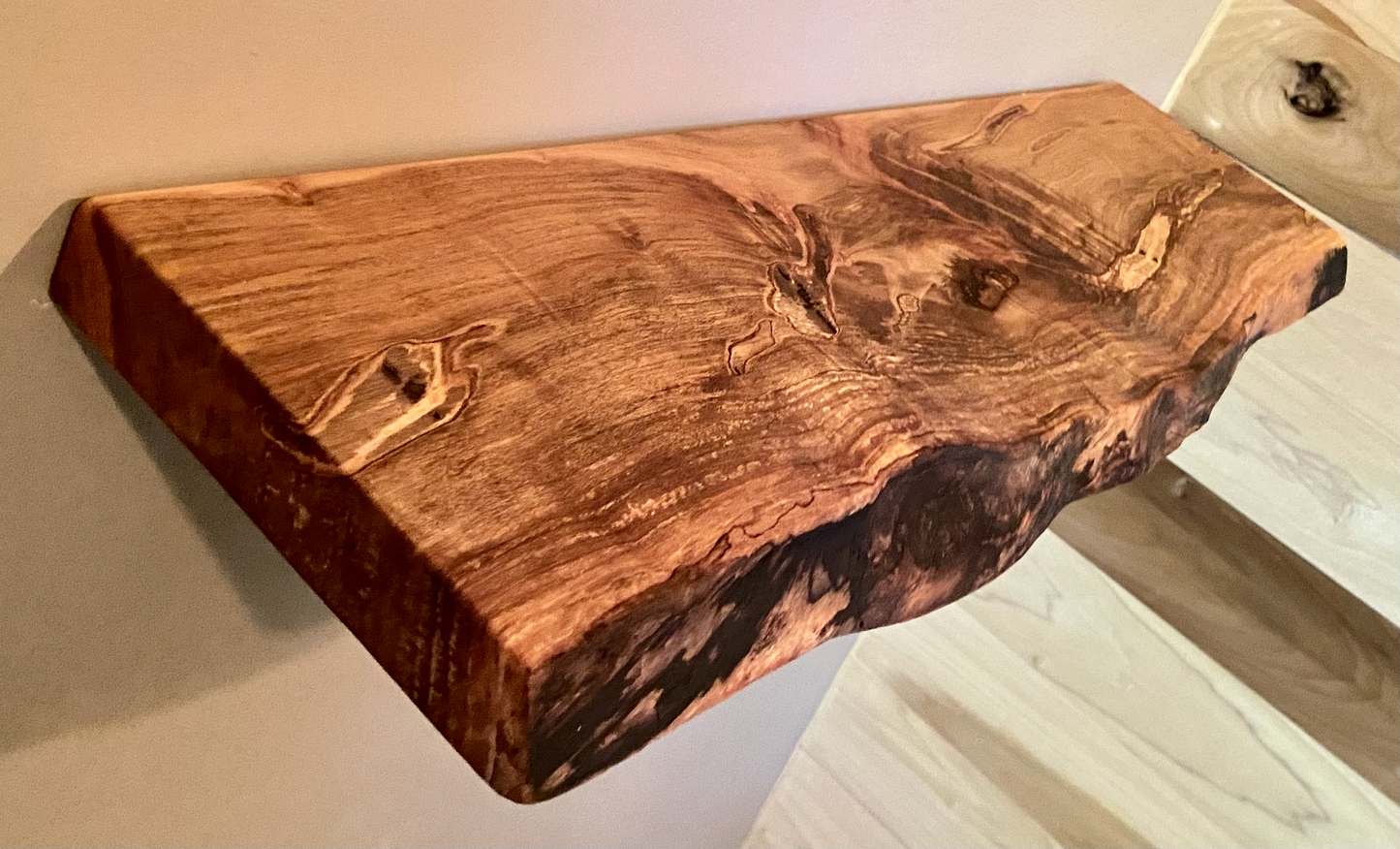 Custom live edge maple shelves with natural wood grain, handcrafted from solid maple. Ideal for rustic, modern, or farmhouse interiors.