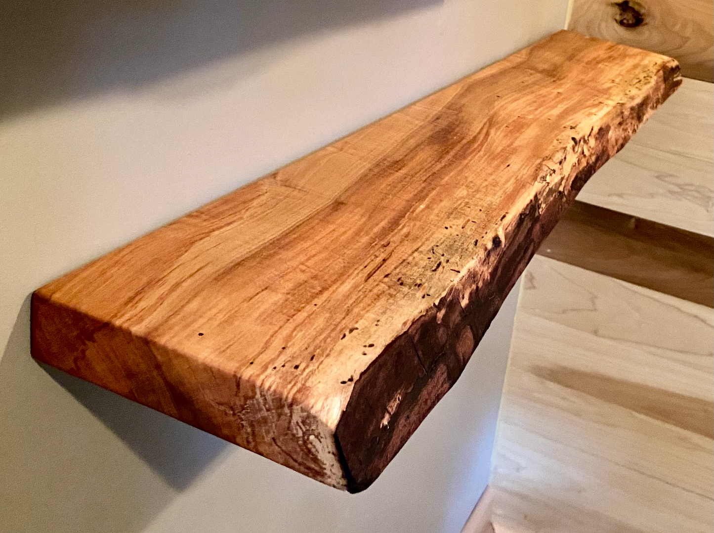 Custom live edge maple shelves with natural wood grain, handcrafted from solid maple. Ideal for rustic, modern, or farmhouse interiors.