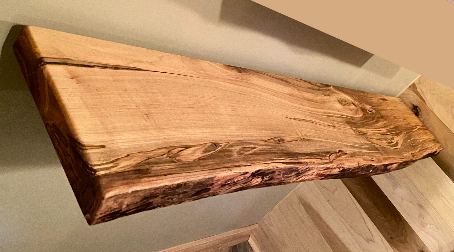 Custom live edge maple shelves with natural wood grain, handcrafted from solid maple. Ideal for rustic, modern, or farmhouse interiors.