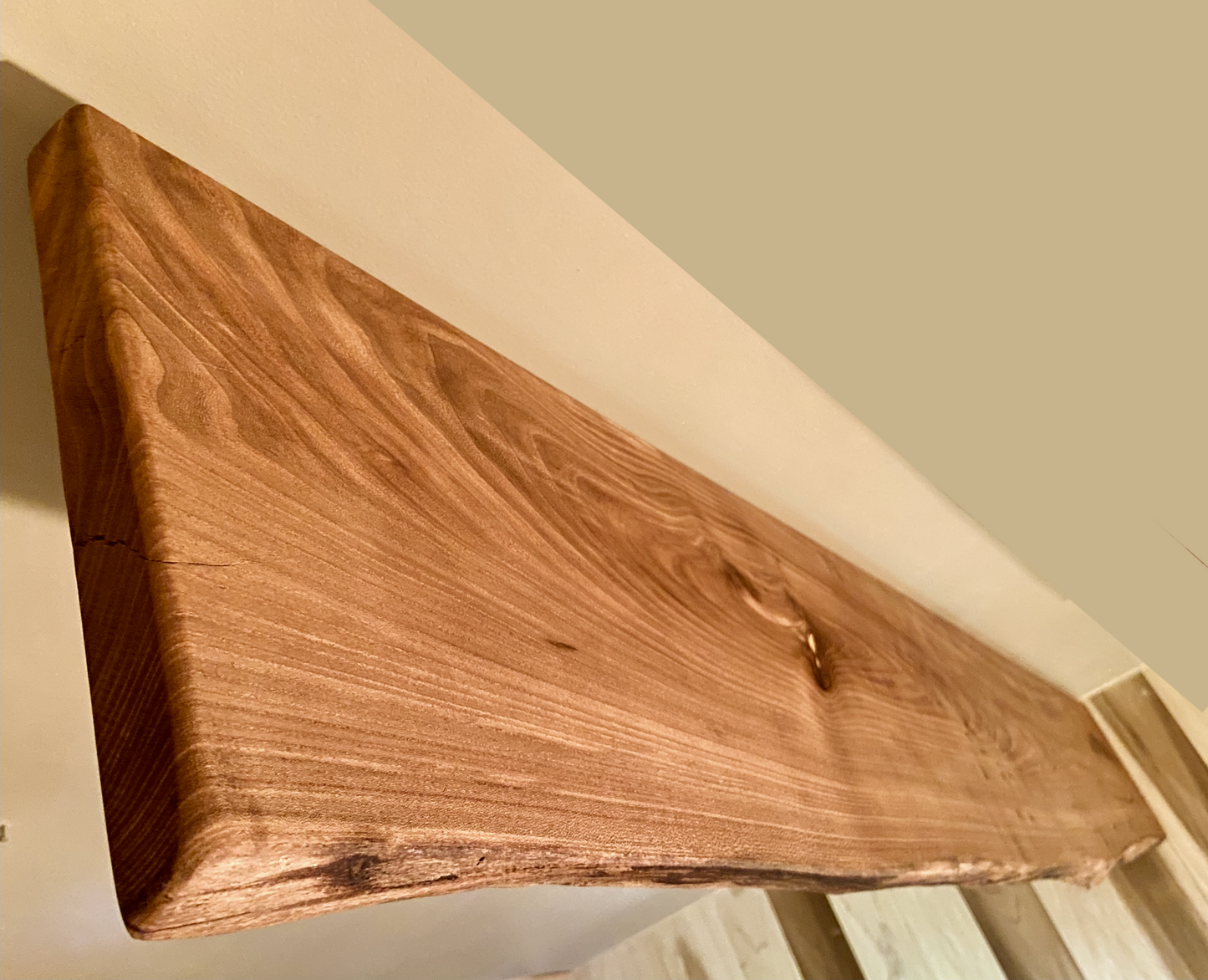 Custom live edge chestnut shelves with warm golden-brown tones and a natural edge. Solid chestnut wood, perfect for rustic and modern interiors.