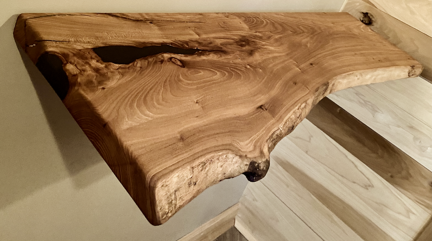 Custom live edge chestnut shelves with warm golden-brown tones and a natural edge. Solid chestnut wood, perfect for rustic and modern interiors.