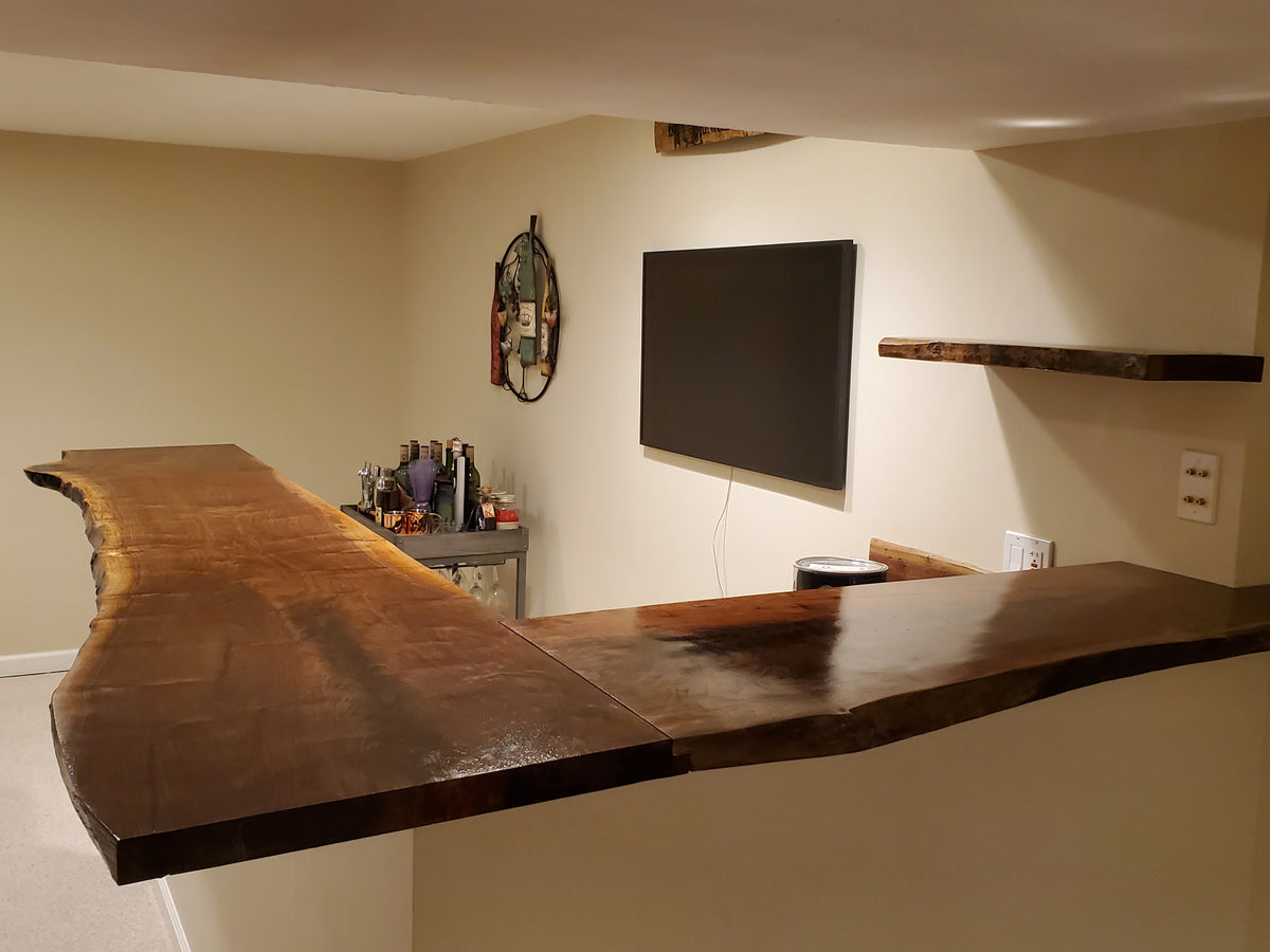 custom live edge black walnut bar top with epoxy