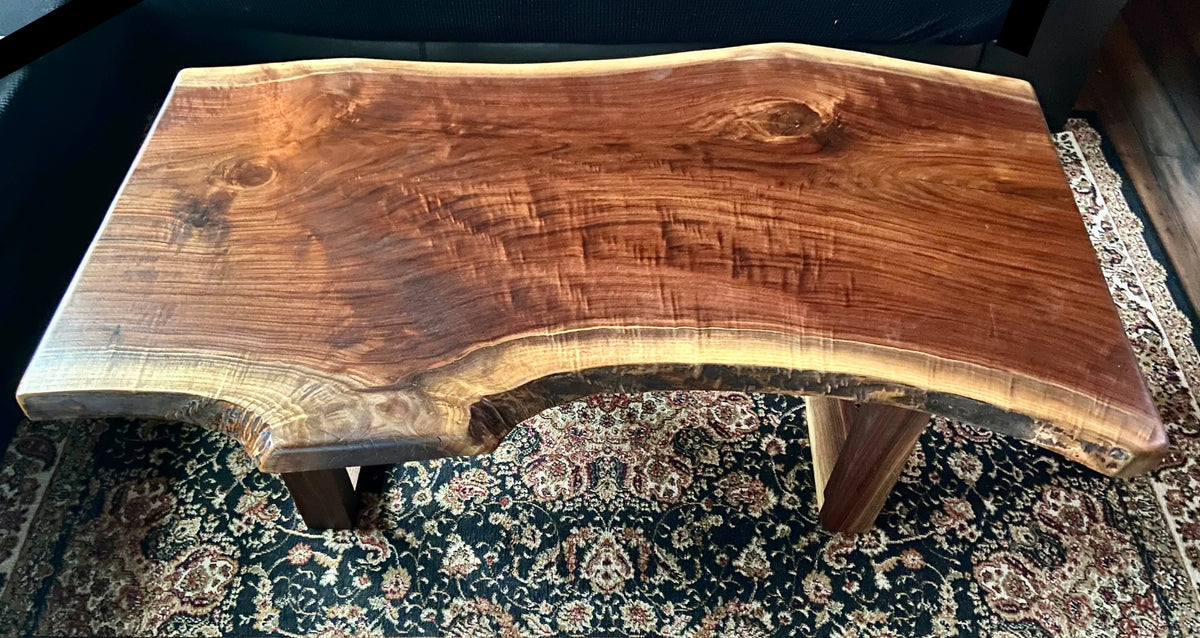 Beautiful live edge walnut coffee table with handcrafted square walnut legs from the same tree to complement.
