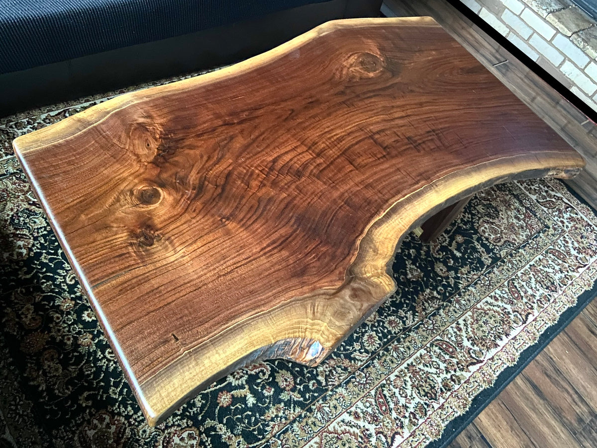 Beautiful live edge walnut coffee table with handcrafted square walnut legs from the same tree to complement.