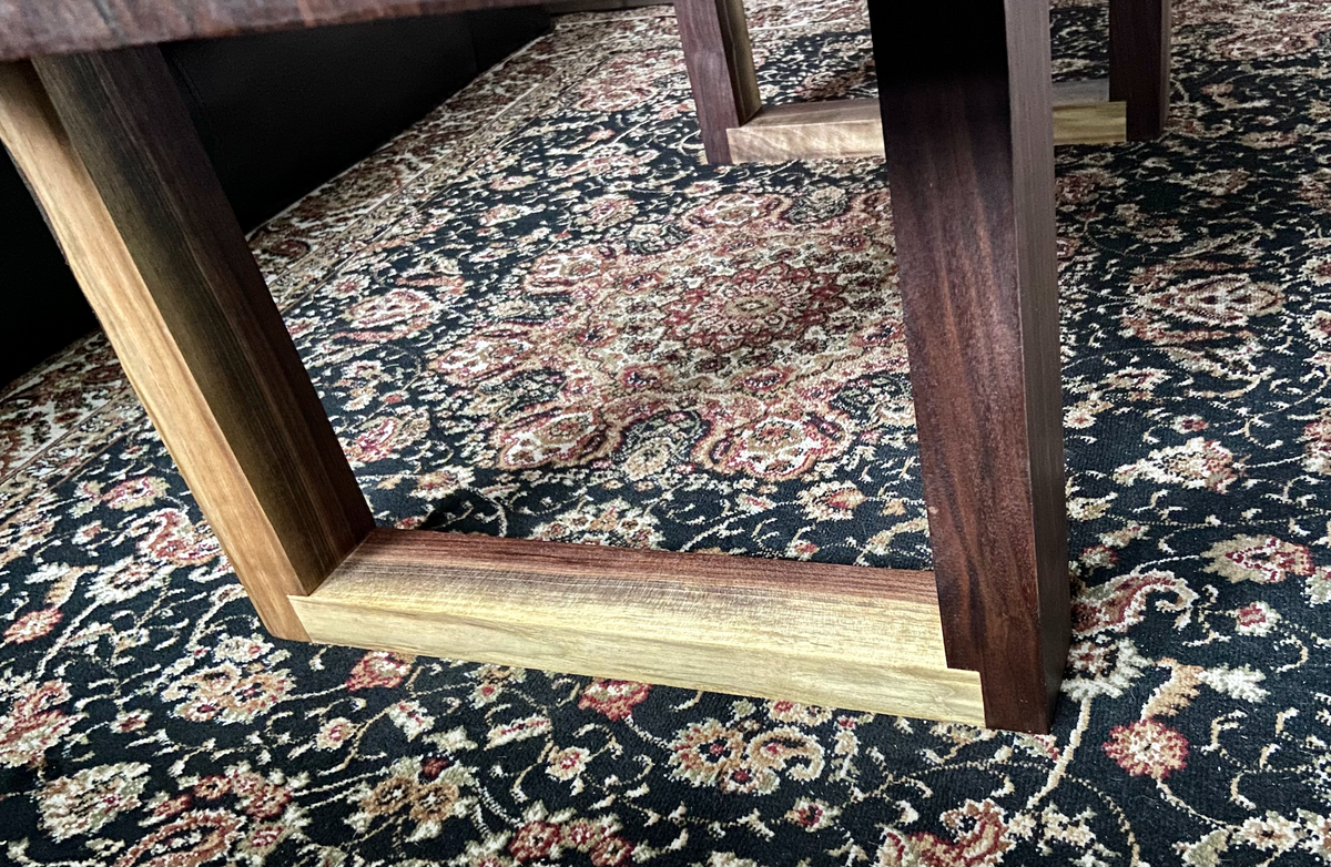 Beautiful live edge walnut coffee table with handcrafted square walnut legs from the same tree to complement.