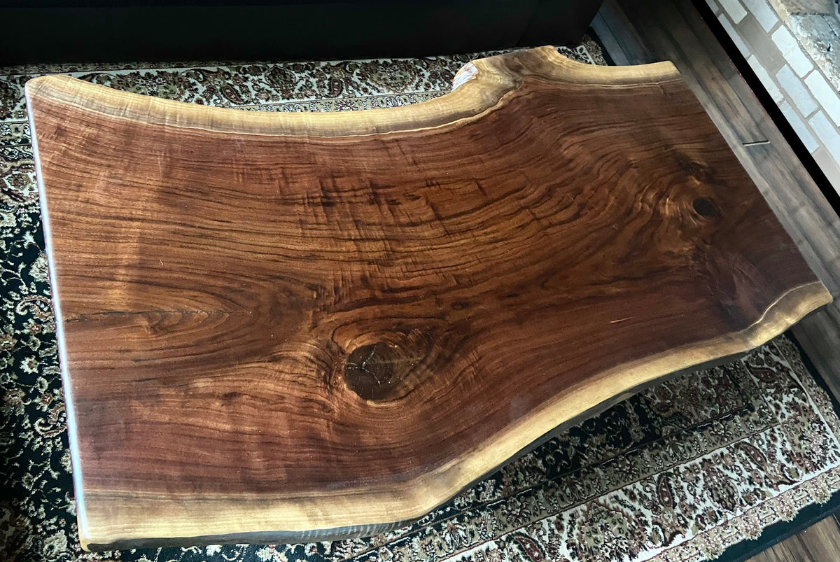 Beautiful live edge walnut coffee table with handcrafted square walnut legs from the same tree to complement.