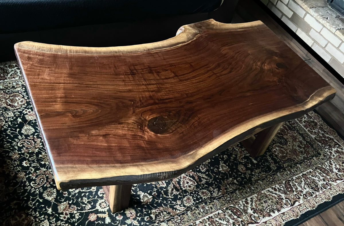 Beautiful live edge walnut coffee table with handcrafted square walnut legs from the same tree to complement.