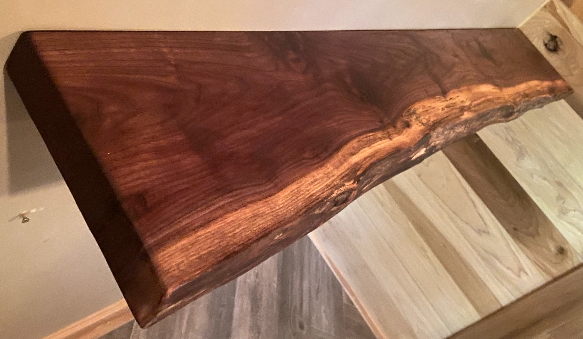 Custom live edge walnut shelves with natural wood grain, handcrafted from solid maple. Ideal for rustic, modern, or farmhouse interiors.