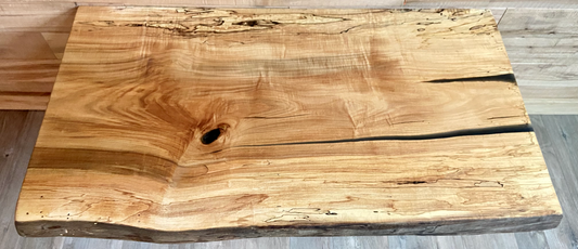 Handmade spalted hardwood vanity top with smooth finish and organic live edge front. Solid wood bathroom vanity top featuring spalted grain, knot detail, and natural character. 