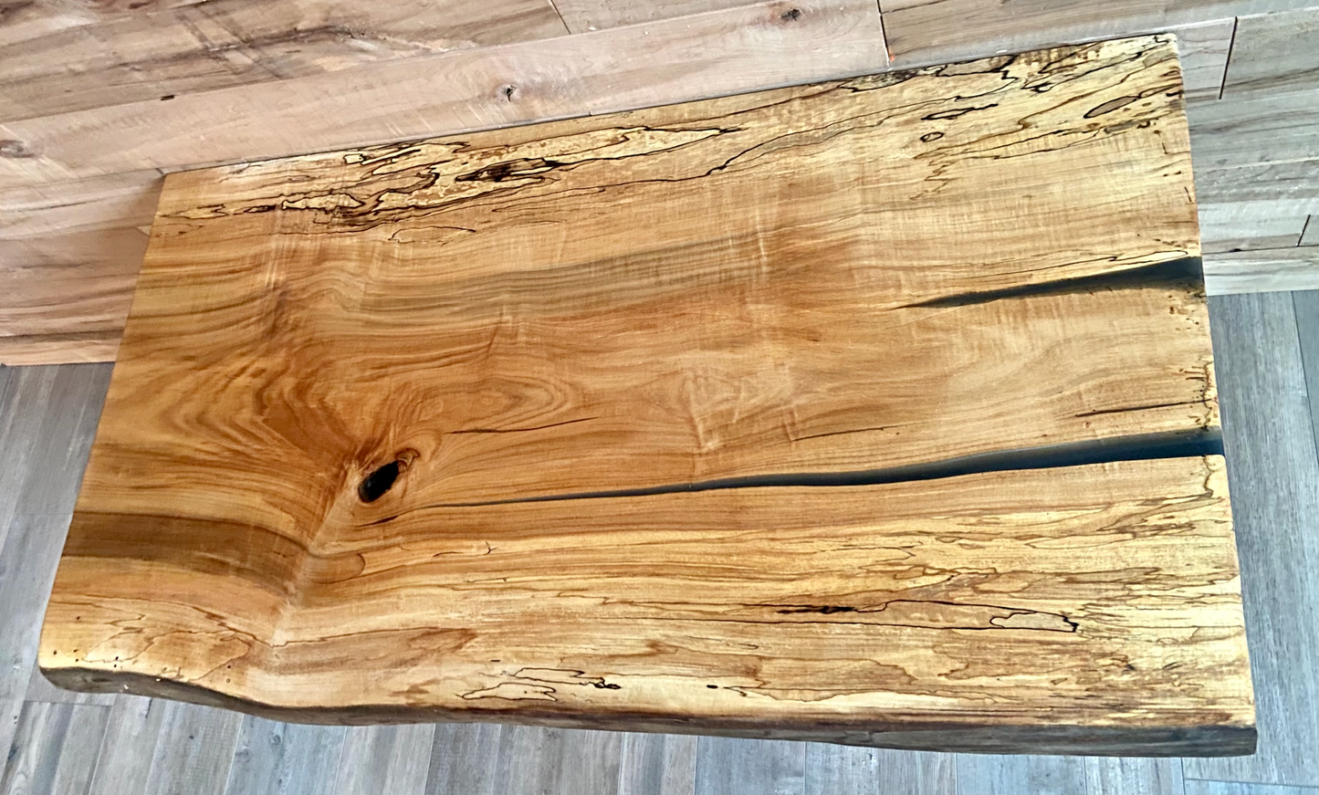 Handmade spalted hardwood vanity top with smooth finish and organic live edge front. Solid wood bathroom vanity top featuring spalted grain, knot detail, and natural character. 