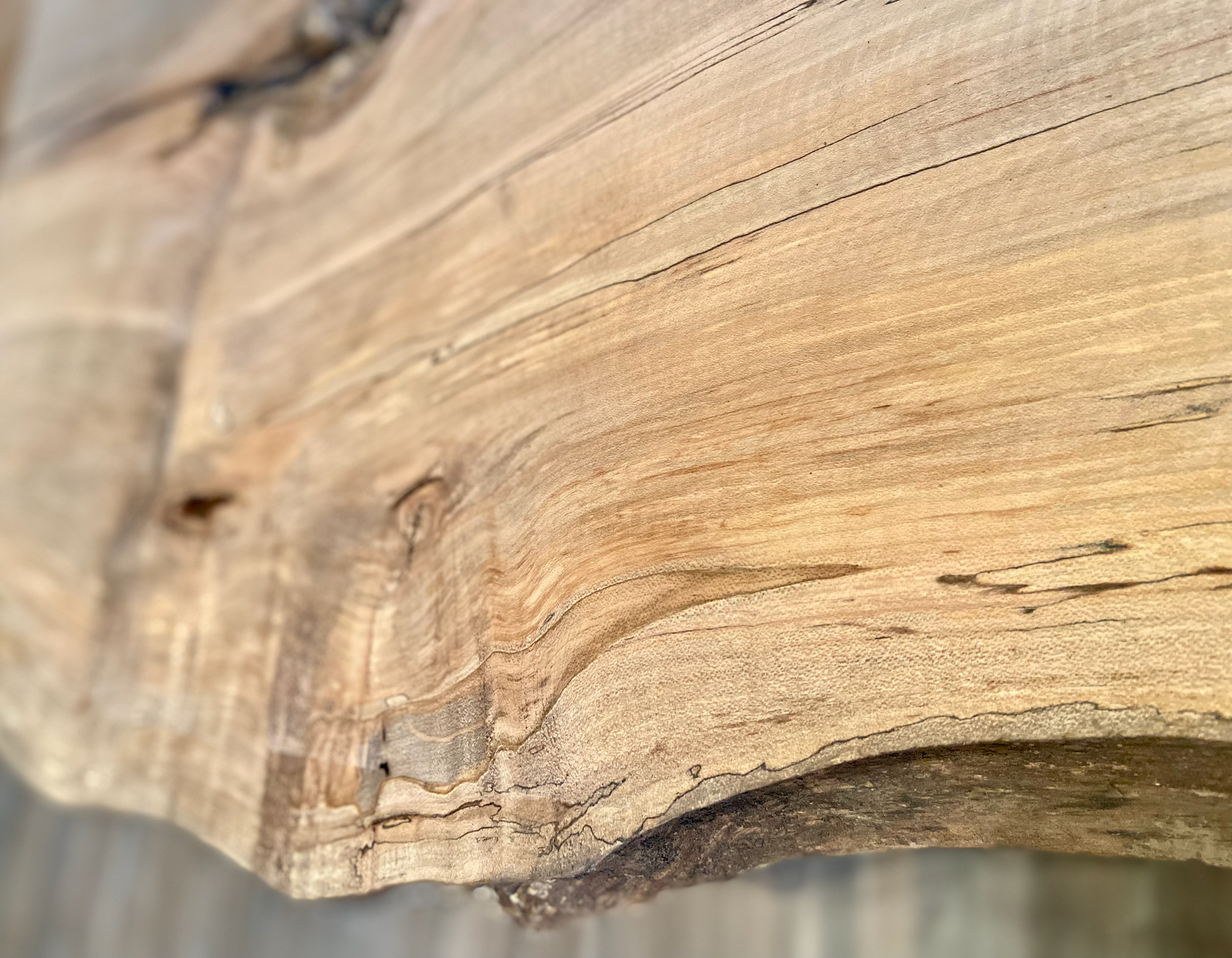 Handmade spalted hardwood vanity top with smooth finish and organic live edge front. Solid wood bathroom vanity top featuring spalted grain, knot detail, and natural character. 