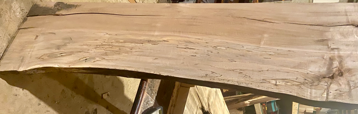 Handmade spalted hardwood vanity top with smooth finish and organic live edge front. Solid wood bathroom vanity top featuring spalted grain, knot detail, and natural character.