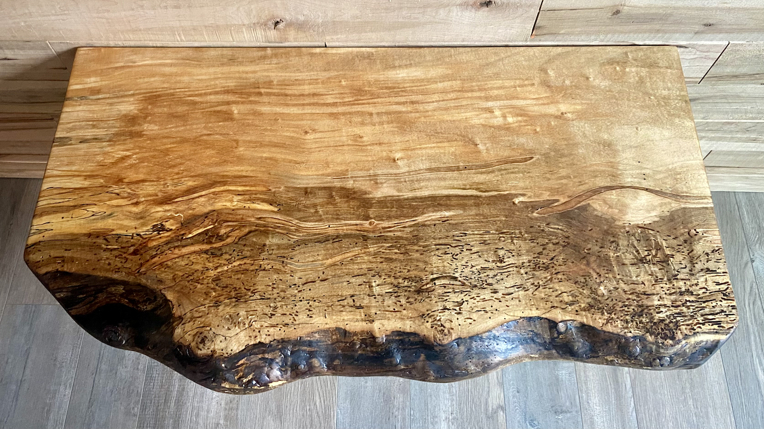 Handmade spalted hardwood vanity top with smooth finish and organic live edge front. Solid wood bathroom vanity top featuring spalted grain, knot detail, and natural character.