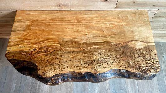 Handmade spalted hardwood vanity top with smooth finish and organic live edge front. Solid wood bathroom vanity top featuring spalted grain, knot detail, and natural character.