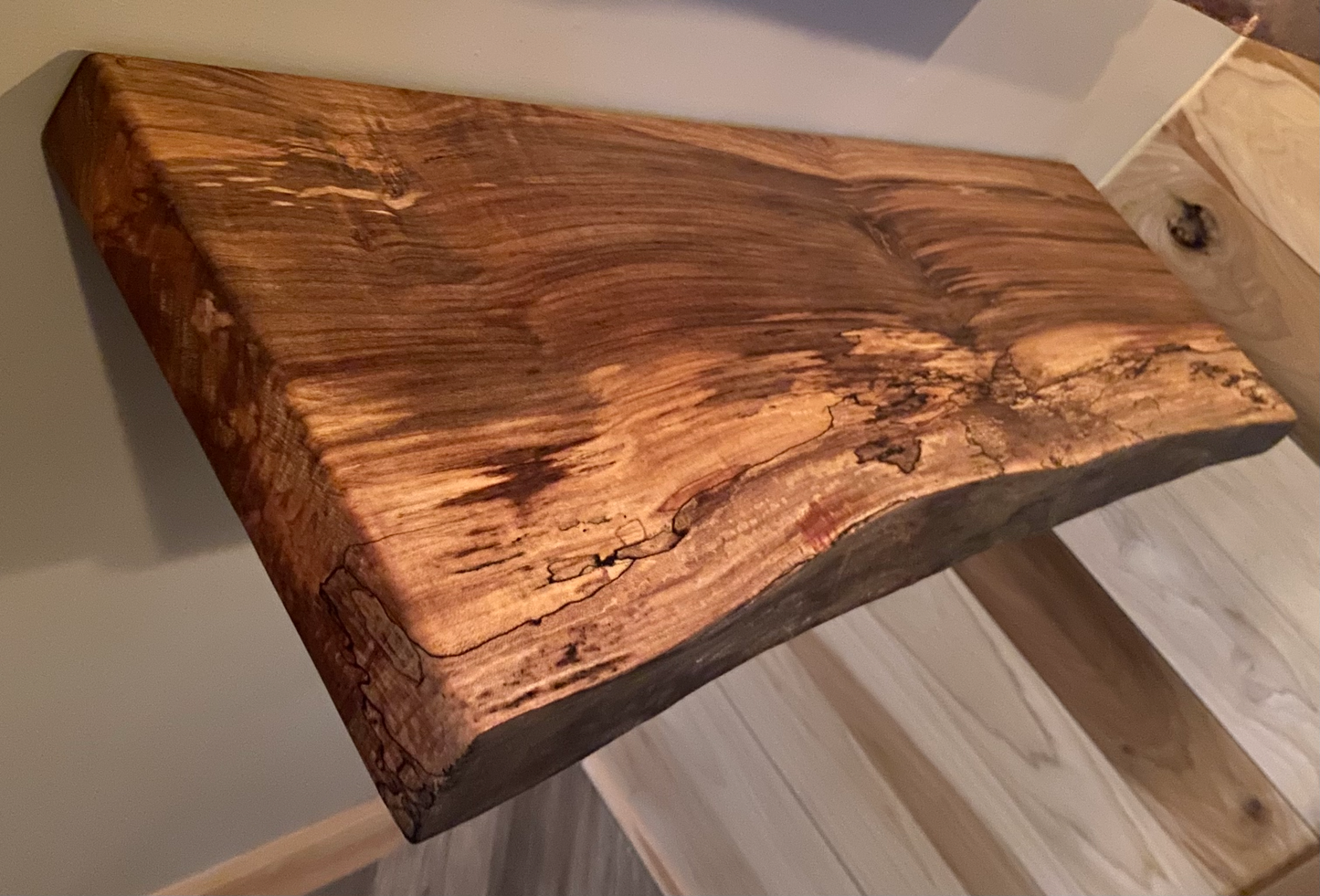 Custom live edge maple shelves with natural wood grain, handcrafted from solid maple. Ideal for rustic, modern, or farmhouse interiors.