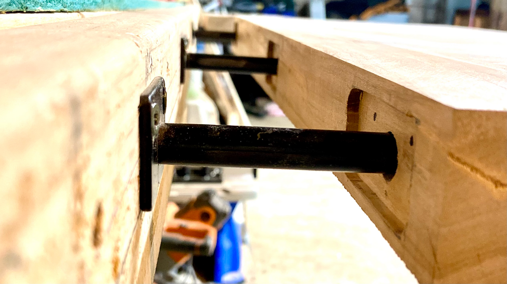 Hidden floating shelf brackets being installed.
