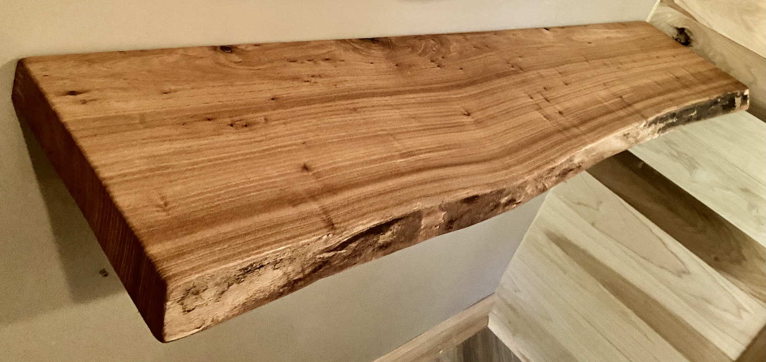 Custom live edge chestnut shelf with natural wood grain, handcrafted from solid maple. Ideal for rustic, modern, or farmhouse interiors.