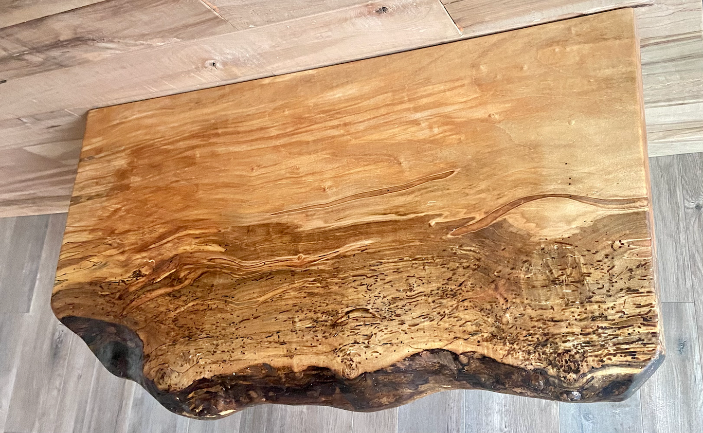 Handmade spalted hardwood vanity top with smooth finish and organic live edge front. Solid wood bathroom vanity top featuring spalted grain, knot detail, and natural character.
